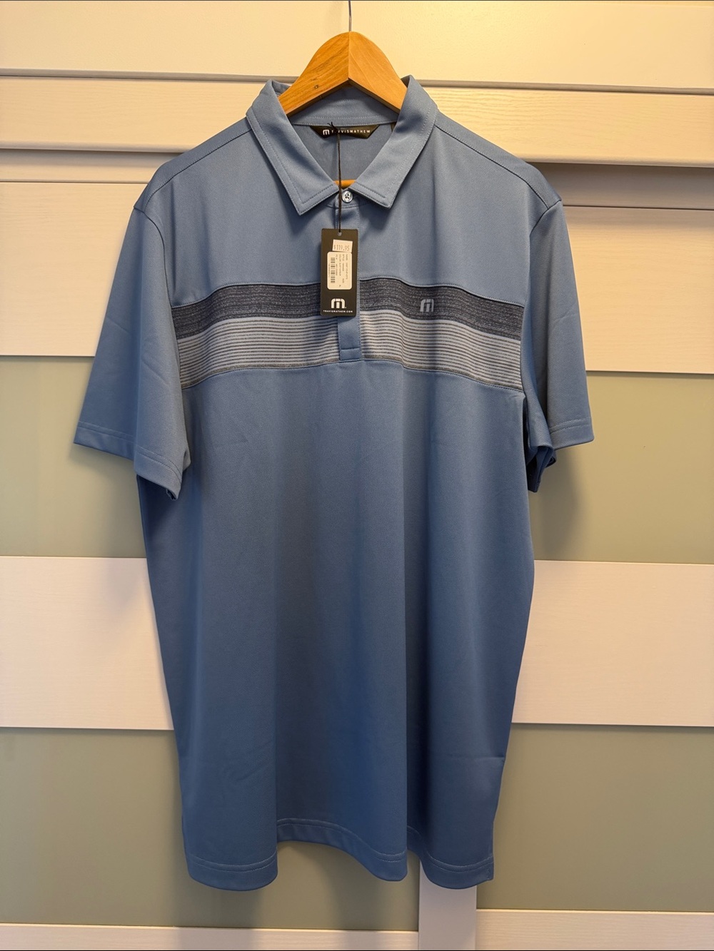 Travis Mathew Light Blue Polo with Navy Stripe Detail